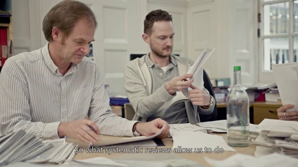 a group of people sitting at a table