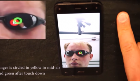 Glass Hands: Interaction Around Unmodified Mobile Devices Using Sunglasses