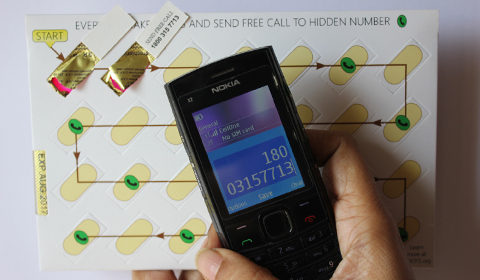 a hand holding a cellphone