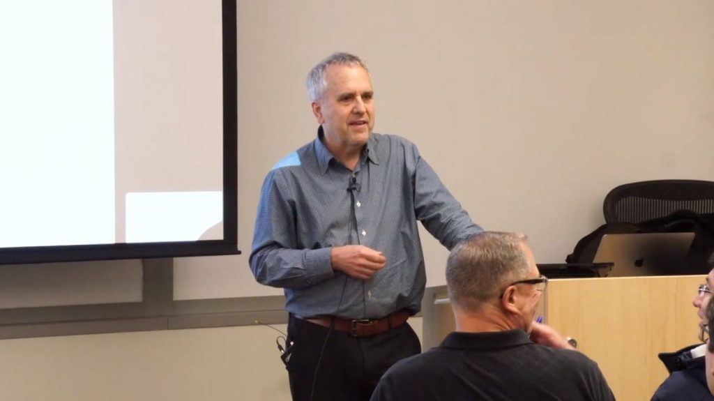 Michael I. Jordan et al. standing in a room