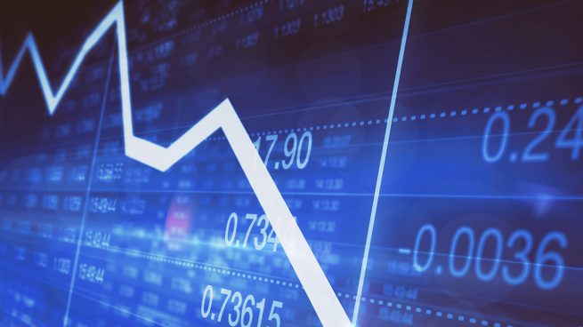 Decreasing line graph on stock market trading screen