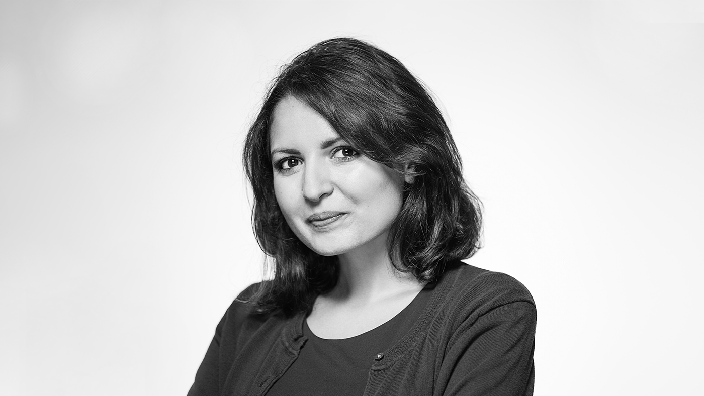 a woman looking at the camera