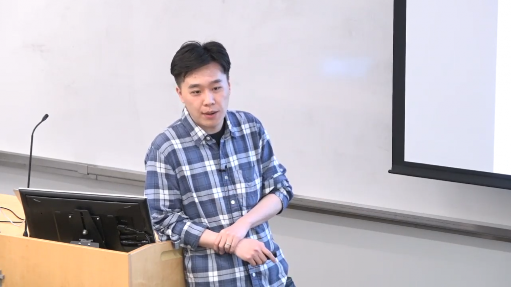 Nan Jiang giving talk On The Hardness of Reinforcement Learning With Value-Function Approximation