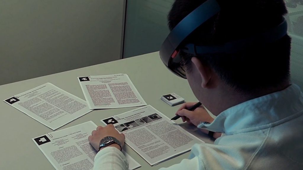 Video: HoloDoc enabling mixed-reality workspaces that harness physical and digital content