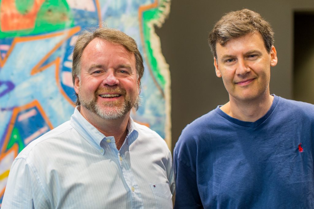 Day Fay and Donald Kossman pose after Kossman's presentation during Faculty Summit 2018.