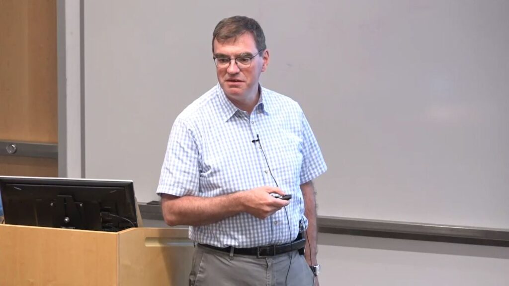 Leon Bottou from Facebook giving talk at Microsoft Research's AI Institute “Geometry of Deep Learning” 2019 Workshop