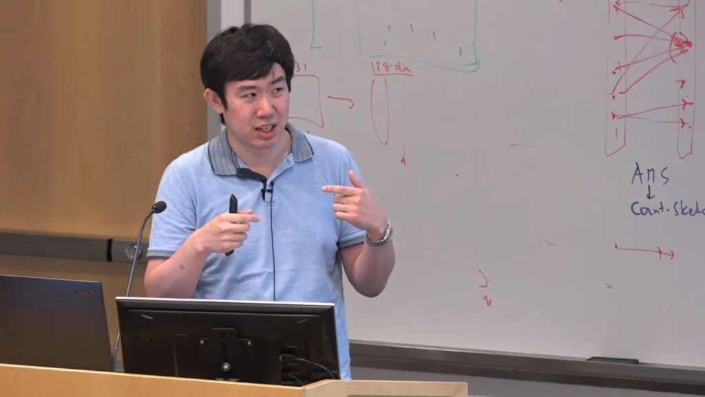 Rong Ge from Duke giving talk at Microsoft Research's AI Institute “Geometry of Deep Learning” 2019 Workshop