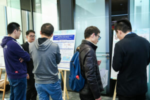 a group of people standing in a room