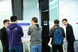 a group of people standing in a room