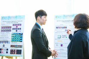 a man standing in front of a screen