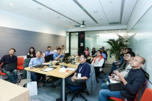 a group of people sitting at a table