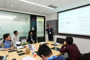 a group of people sitting at a table