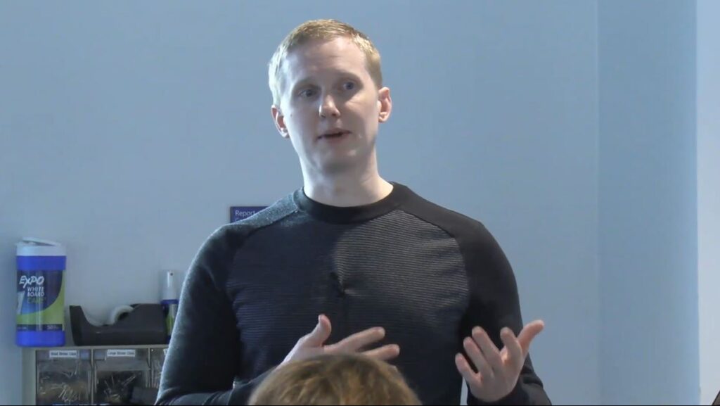 a man and a woman standing in a room