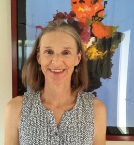 a woman smiling for the camera