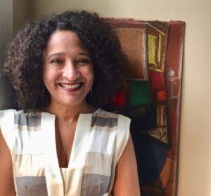 a woman smiling for the camera