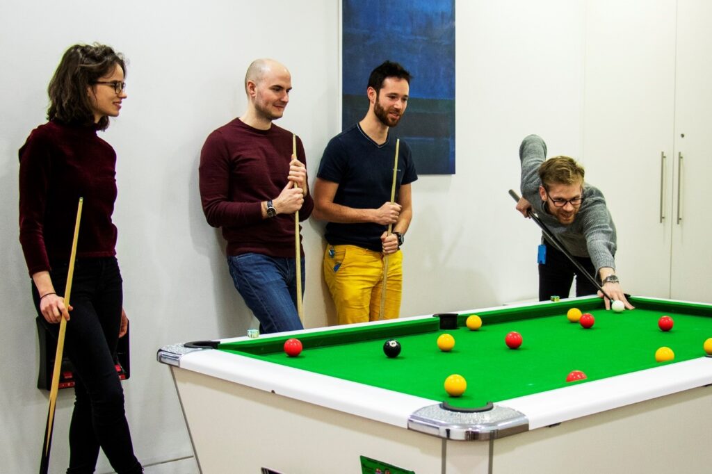 people playing pool