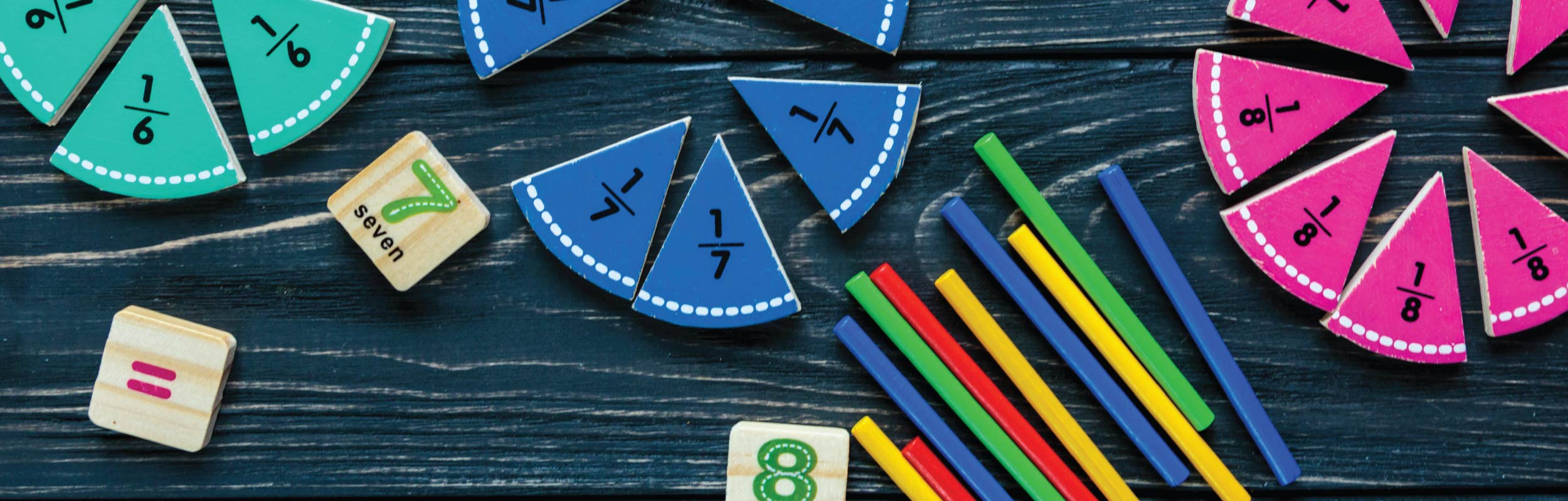 Photograph: Different colored triangular shaped pieces that measure out in fraction amounts. 