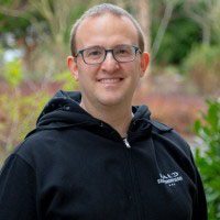 Portrait of Dr. Josh Menke from Microsoft and speaker at the Microsoft Research AI and Gaming Research Summit