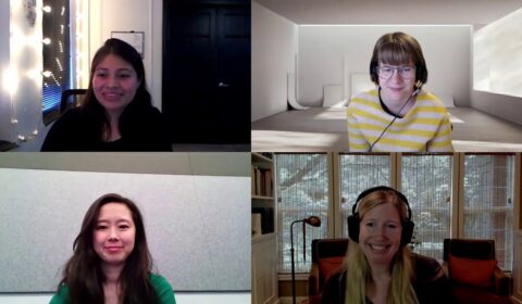Haiyan Zhang standing in front of a window posing for the camera