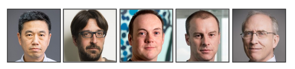 a group of people posing for the camera