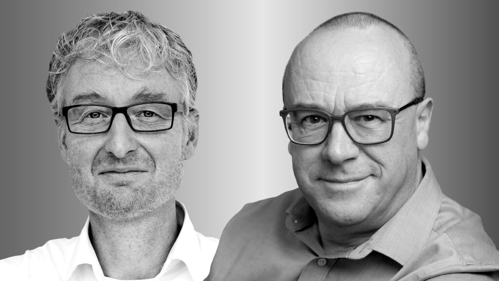 Two people side by side, Max Welling on the left and Chris Bishop on the right, in black and white smile and look forward.