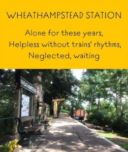 A picture of the platform at Wheathampstead Station with a haiku overlaid reading: Alone for these years, helpless without trains’ rhythms, neglected, waiting.” 