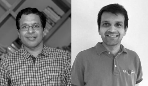 a couple of people posing for the camera