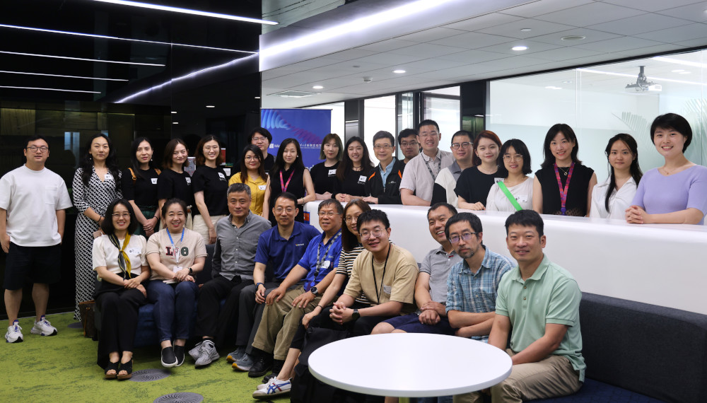 Teddy Zee et al. posing for a photo