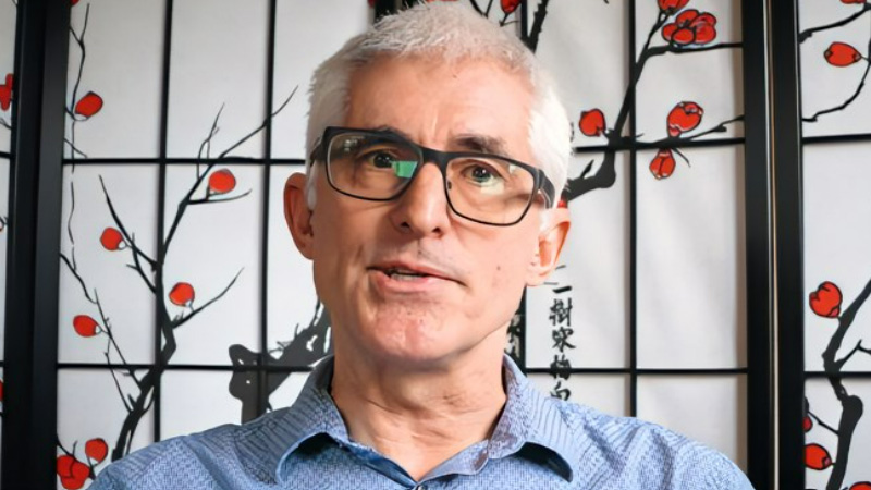 Project Origin - Tech Minutes video - man with glasses speaking