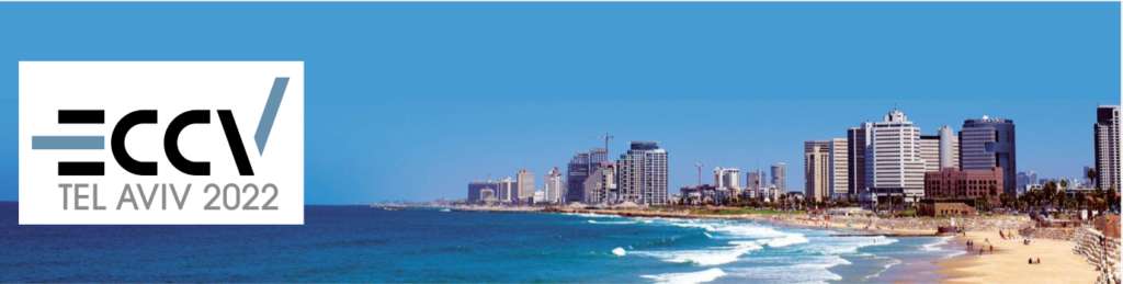 a large body of water with a city in the background