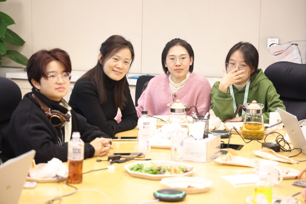 a group of people sitting at a table