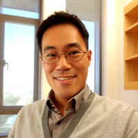 a person smiling for the camera