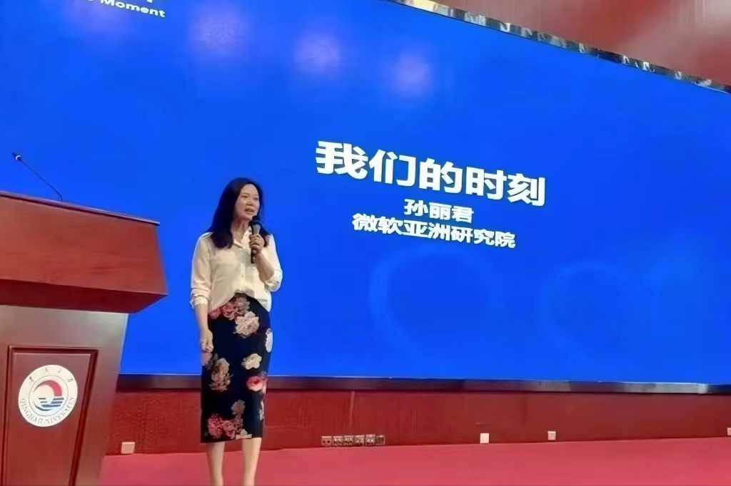 a woman giving a talk