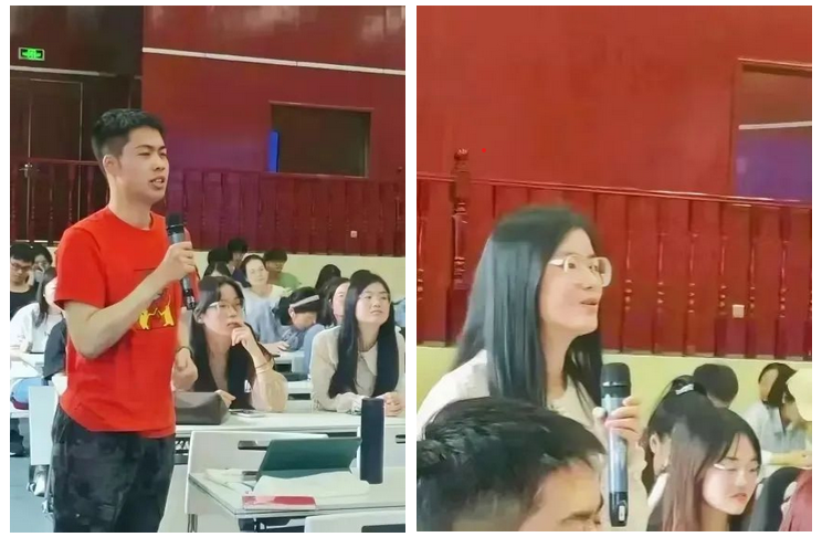 two people stand up asking questions