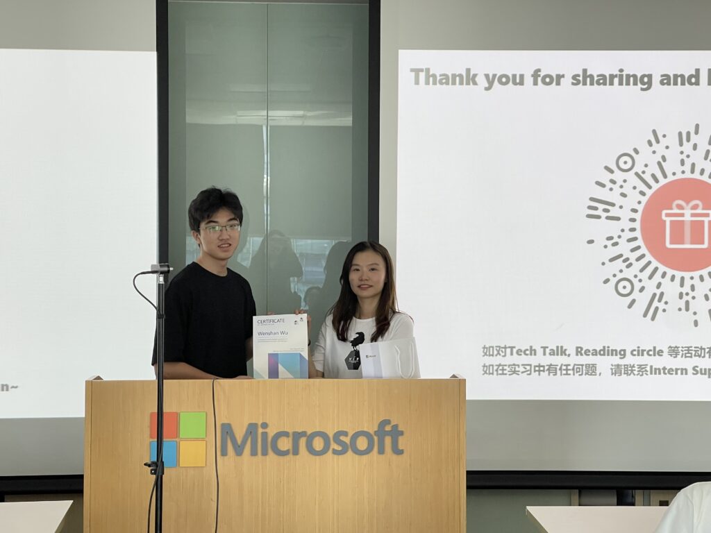 a man and an woman posing for a camera