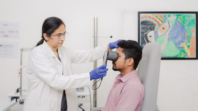 doctor checking a patient's eye