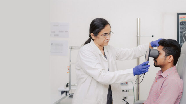 doctor checking a patient's eye