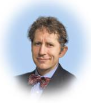 James Evans wearing a suit and tie