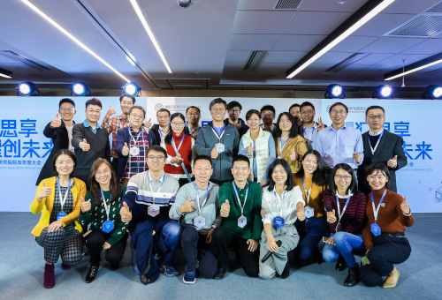 a group of people posing for the camera