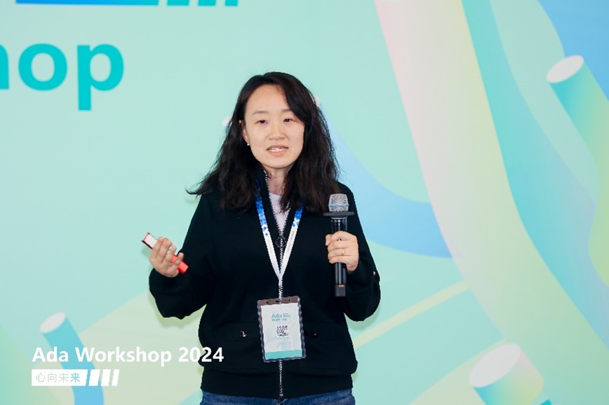 a woman giving a talk