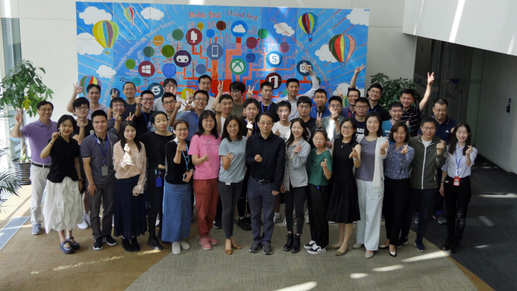 a group of people posing for the camera