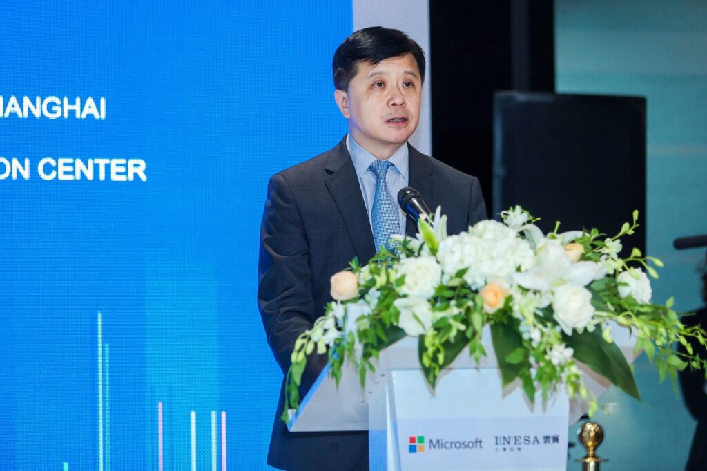 a screen shot of Hsiao-Wuen Hon in a suit and tie