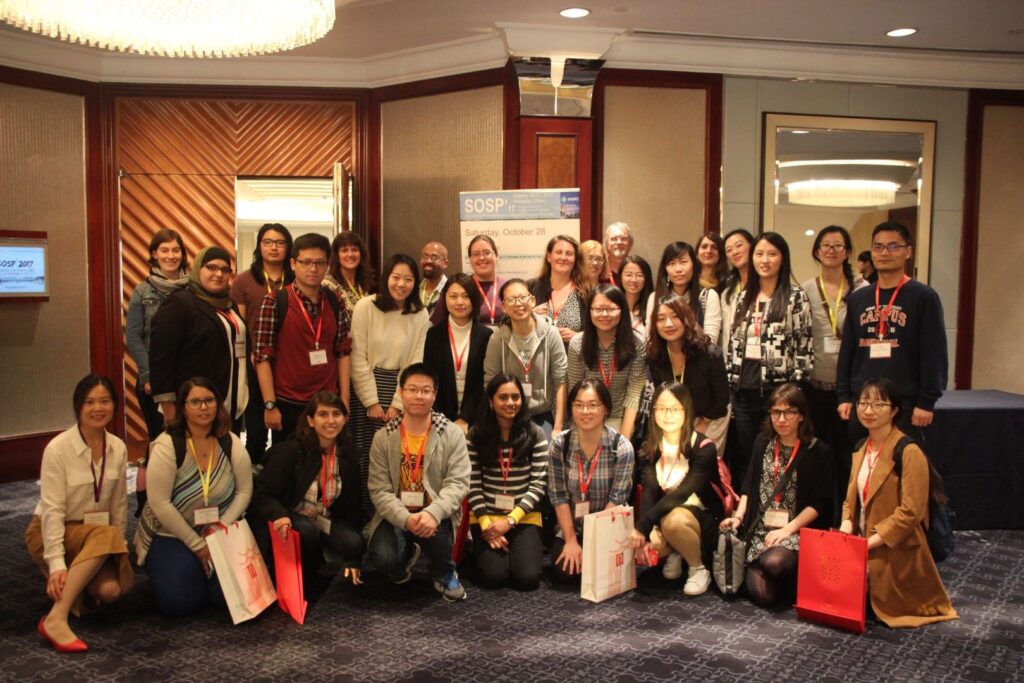 a group of people posing for a photo