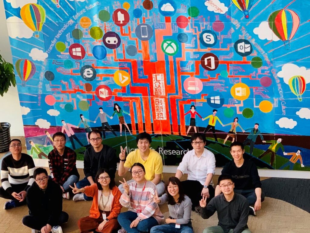 a group of people posing for the camera