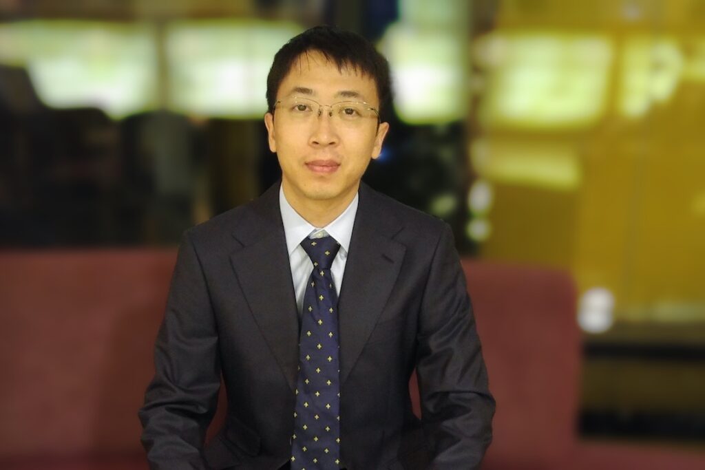 a man wearing a suit and tie