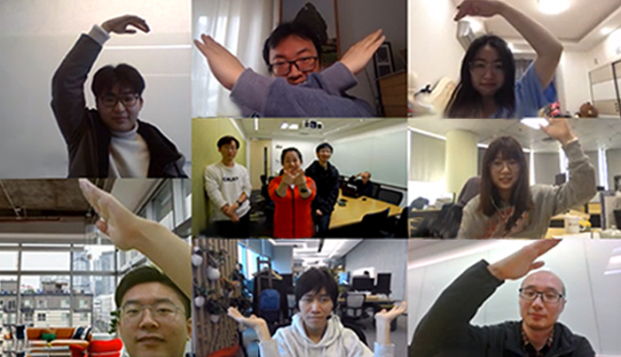 a group of people posing for the camera