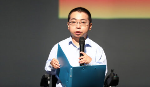 a person wearing a suit and tie