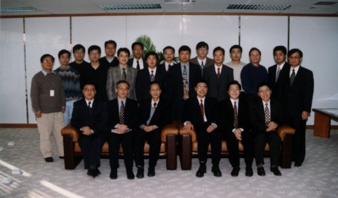 a group of people posing for the camera