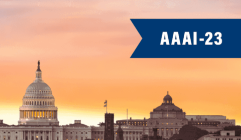 a sign in front of a building