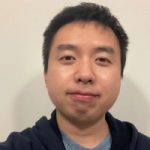 a man smiling for the camera